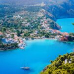 assos-village-in-morning-light-kefalonia-greece-white-lonely-yacht-in-beautiful-turquoise-colored.jpg